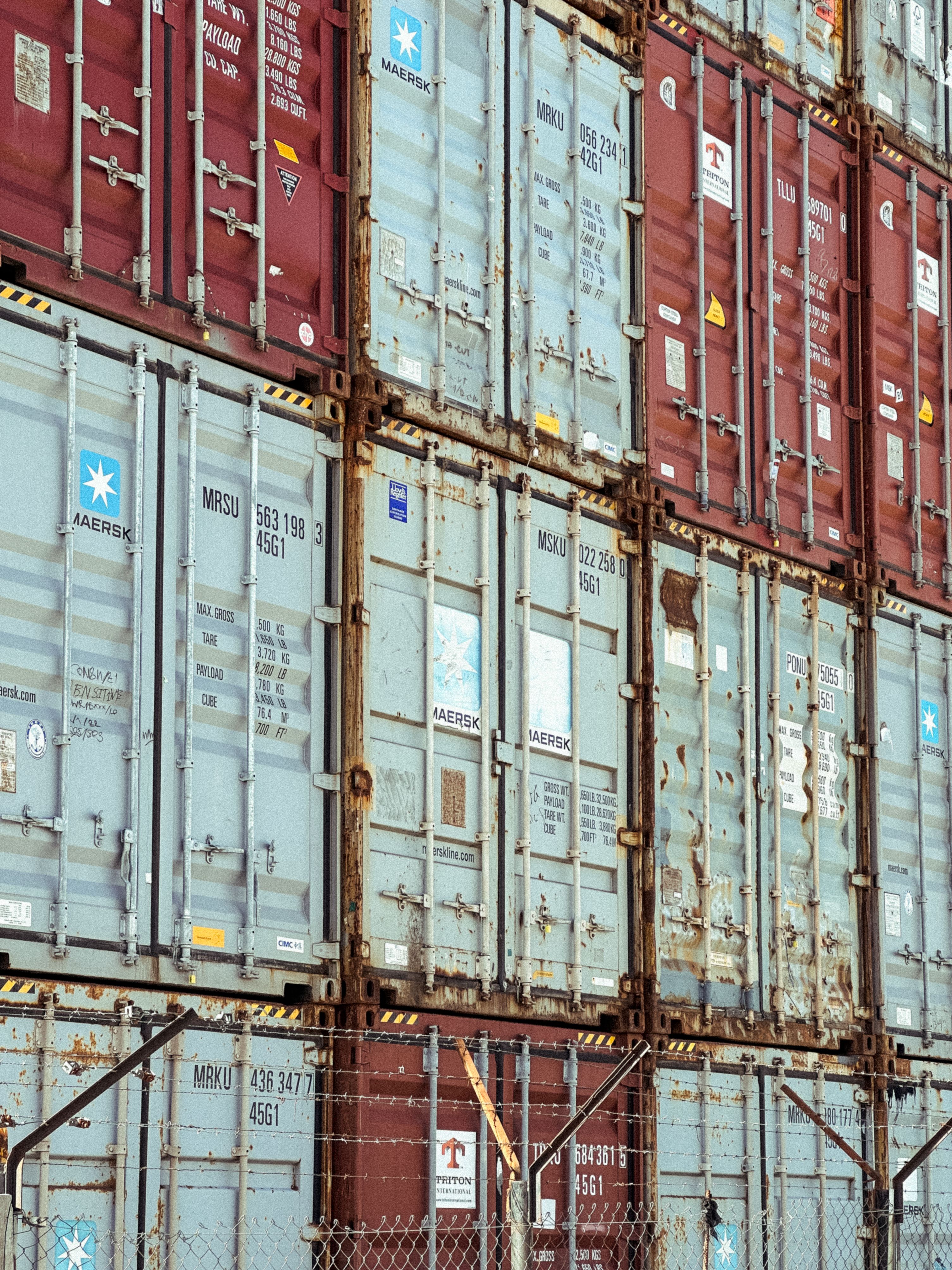 A container ship at port, being loaded or unloaded.