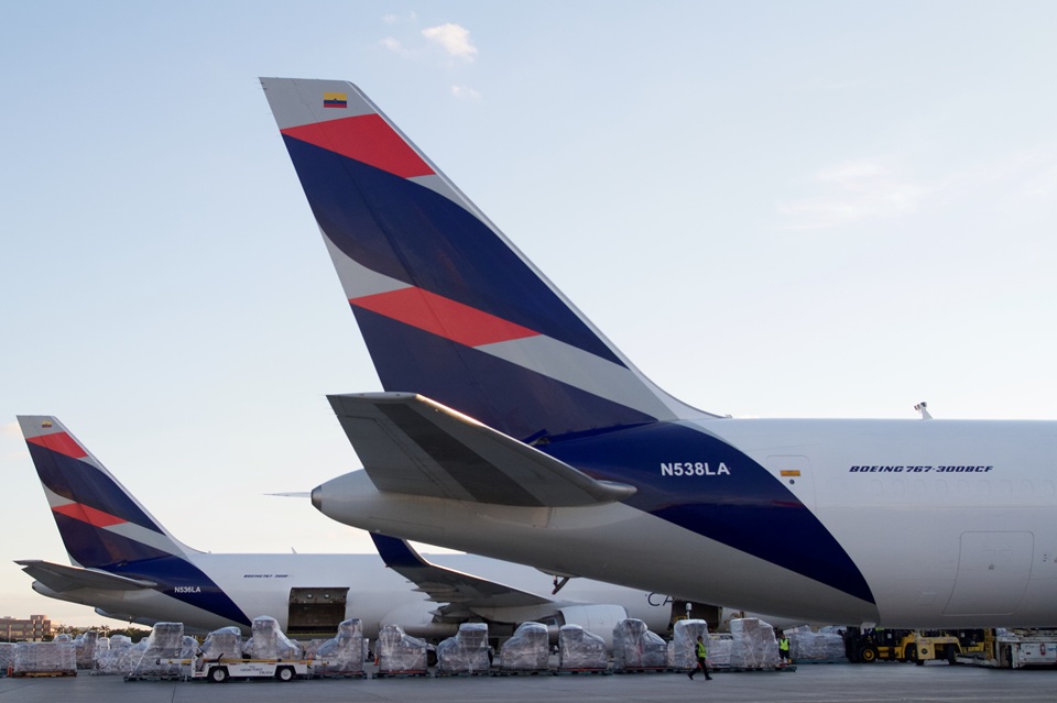 Cargo plane being loaded with containers