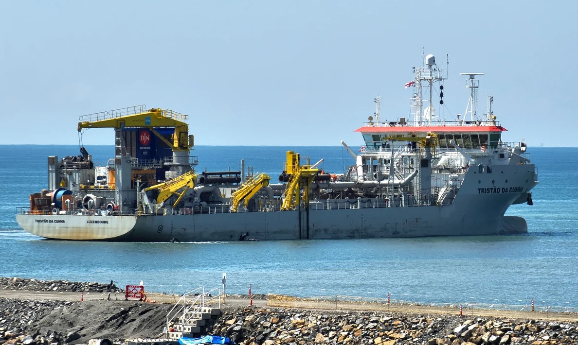 Two trailing suction hopper dredgers working on a port dredging project.