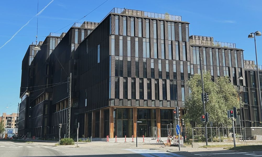 A modern office building in Copenhagen, representing a new business hub.