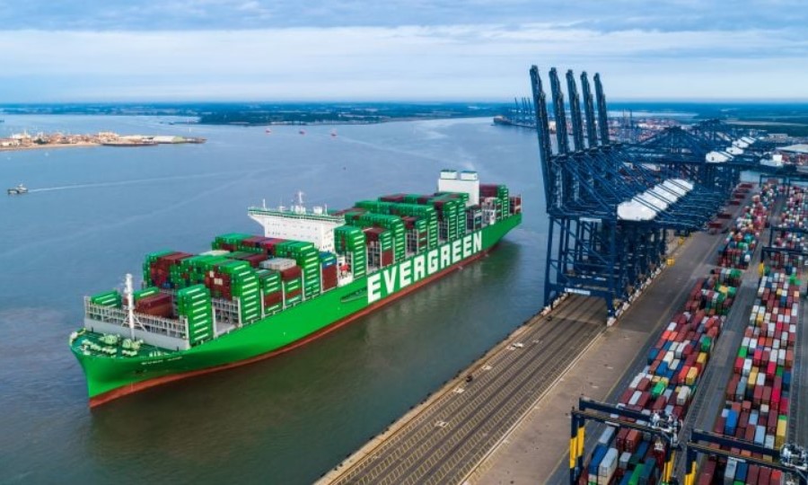 A large container ship at sea, symbolizing maritime logistics and fuel consumption.