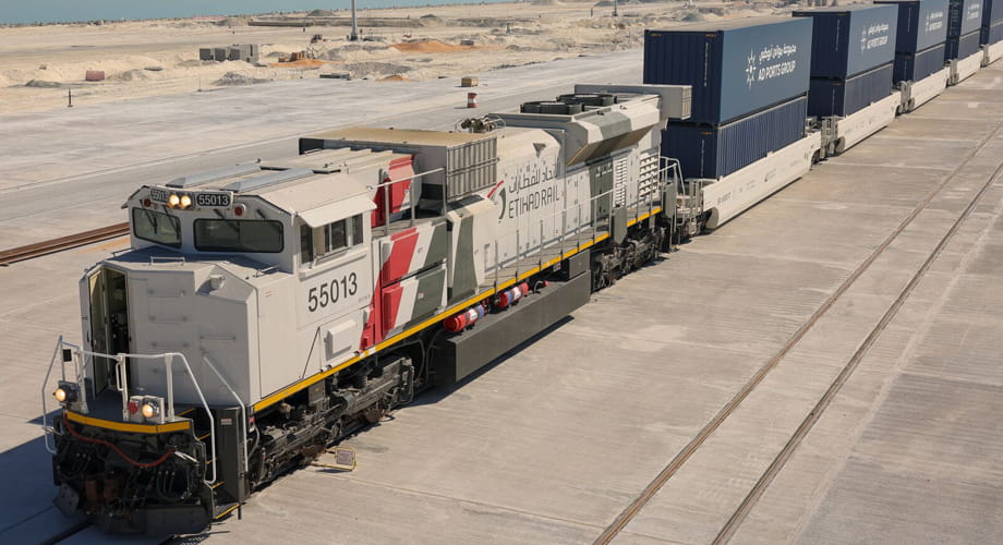 A freight train on a railway track, symbolizing the new Etihad Rail service.